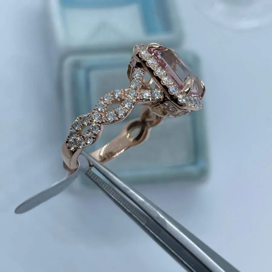 Geometric rose gold electroplated alloy ring shown in structured design