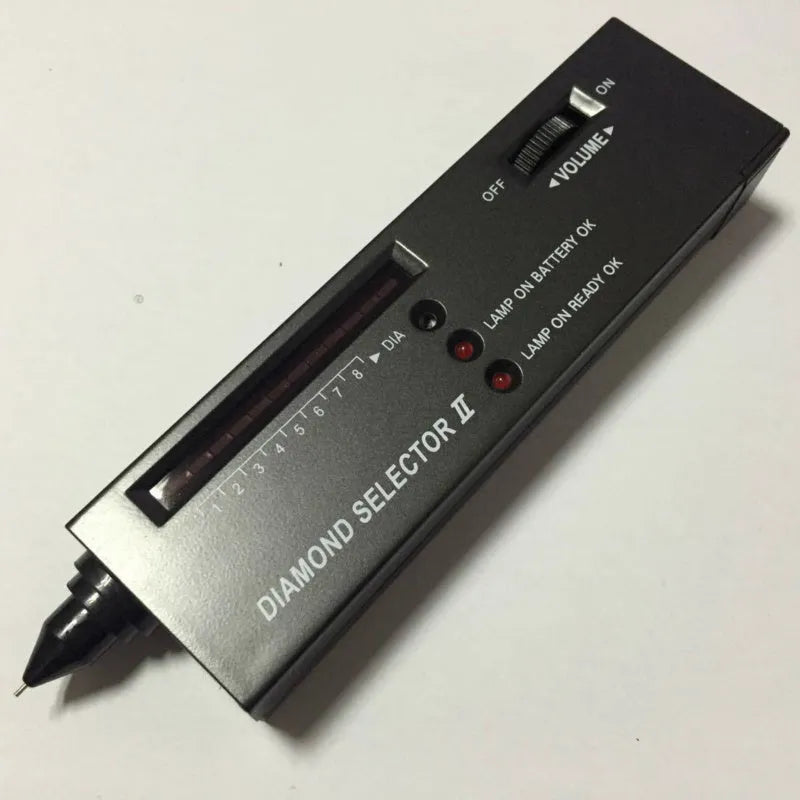 Black handheld second generation diamond thermal conductivity meter on a grey background.
