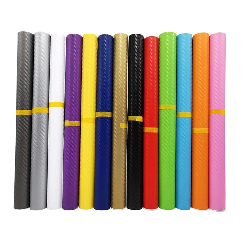 Roll of 3D carbon fibre sticker in assorted colours, showing texture and scale next to a 30cm ruler.