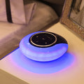 Blue Bluetooth speaker desk lamp with LED light and touch controls on wooden desk