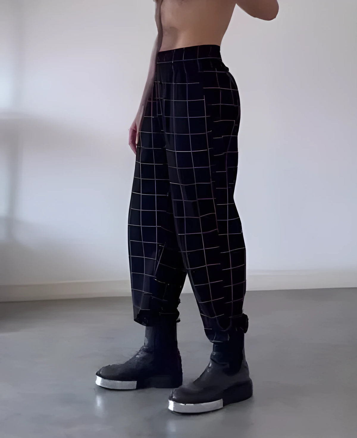 Men's plaid trousers with apron-front design in stretch cotton blend fabric