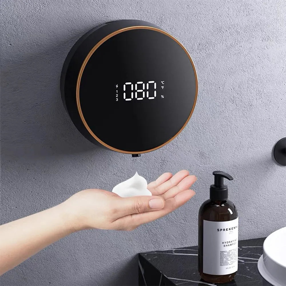 Black automatic foam soap dispenser with infrared sensor and USB charging port mounted on bathroom wall
