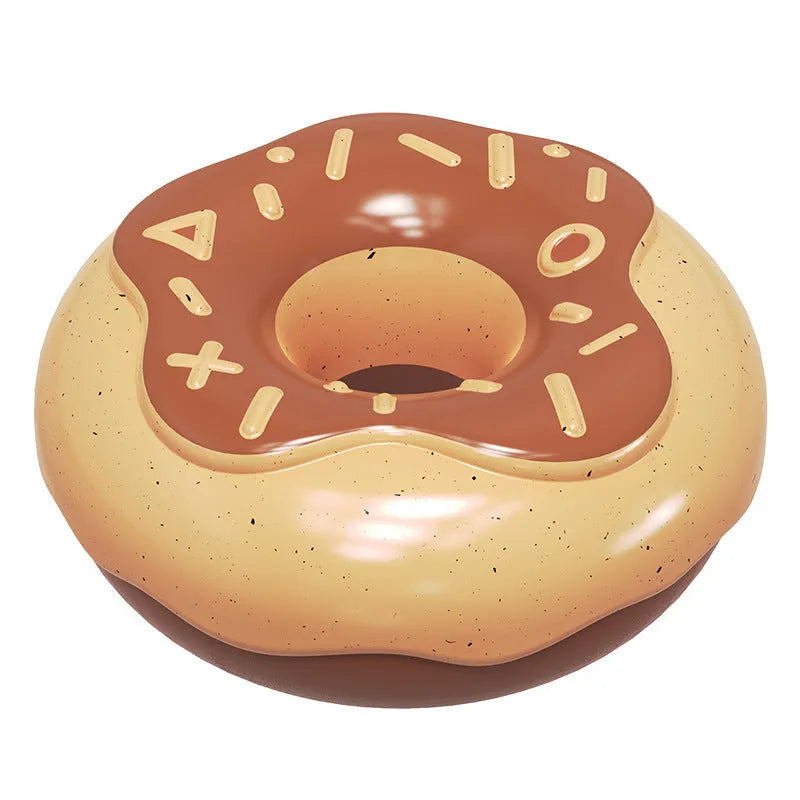 Donut-shaped dog chew toy in pink with textured surface for teeth cleaning