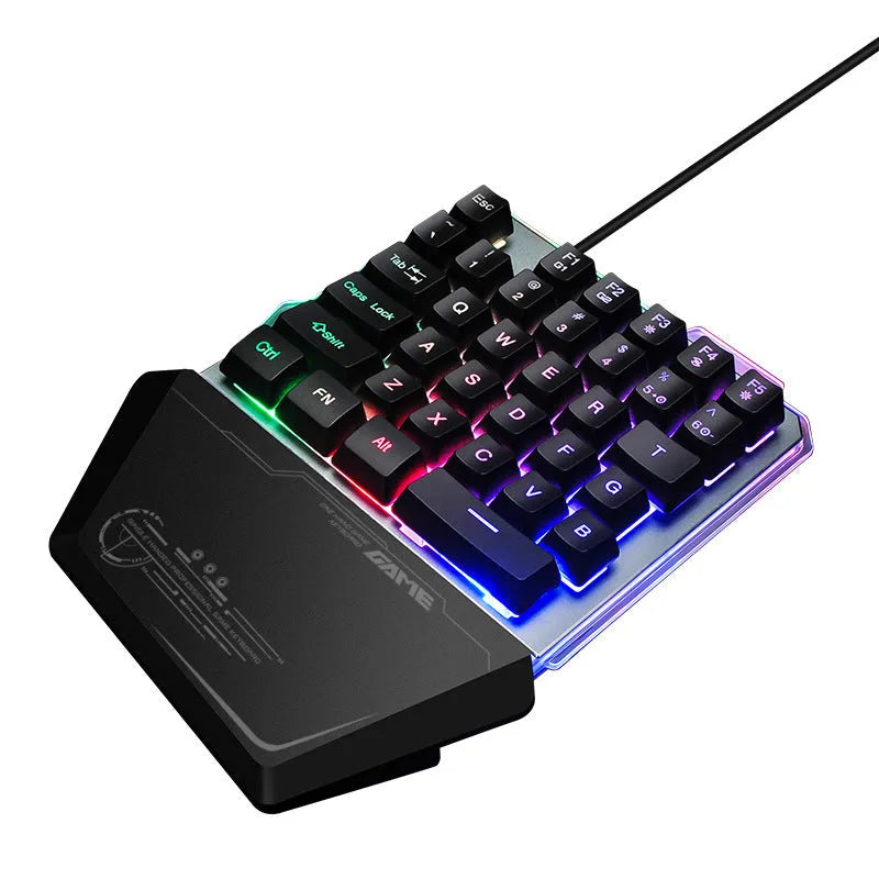 Black G40 one-handed mechanical gaming keyboard with RGB backlit keys on a desktop