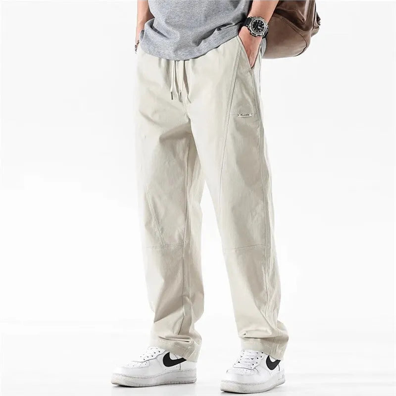 Cotton wide-leg trousers with antibacterial function in milky white and black colours showing pants-mouth design