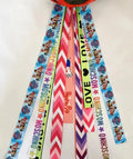 A single colourful ribbon streamer for decorating a child's roller skating or ski helmet.