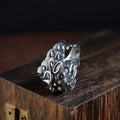 Silver open ring with Jibeast pattern and diamond detailing in retro zodiac design