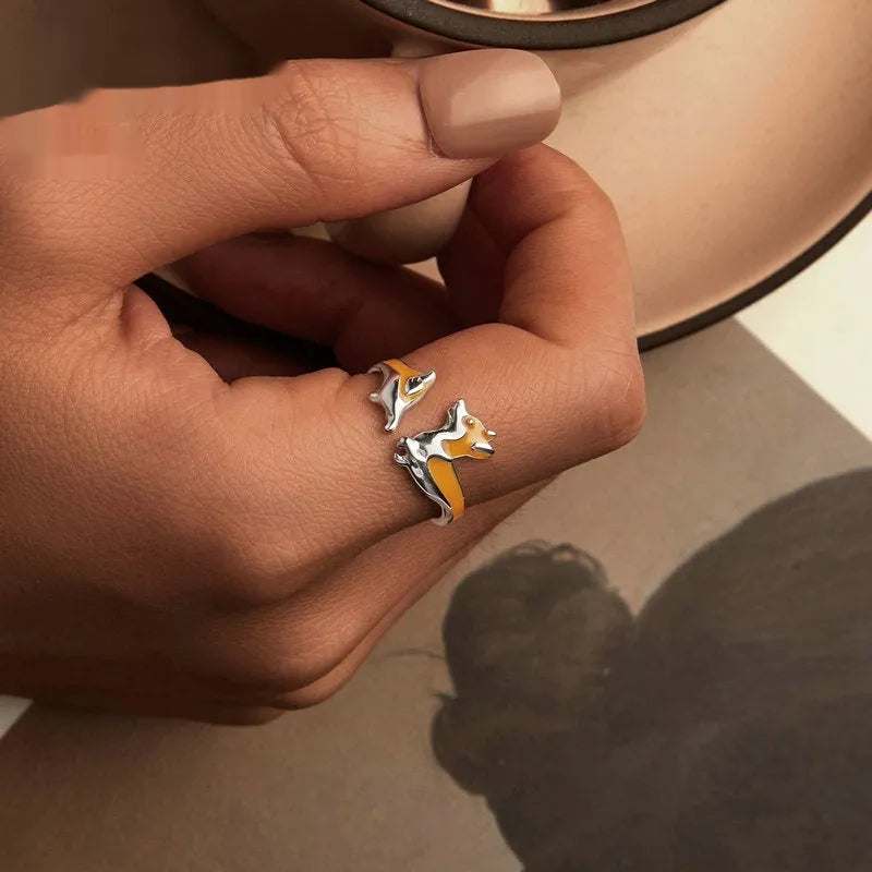 Silver electroplated ring featuring a cartoon corgi dog design in SCR1014-E colour.