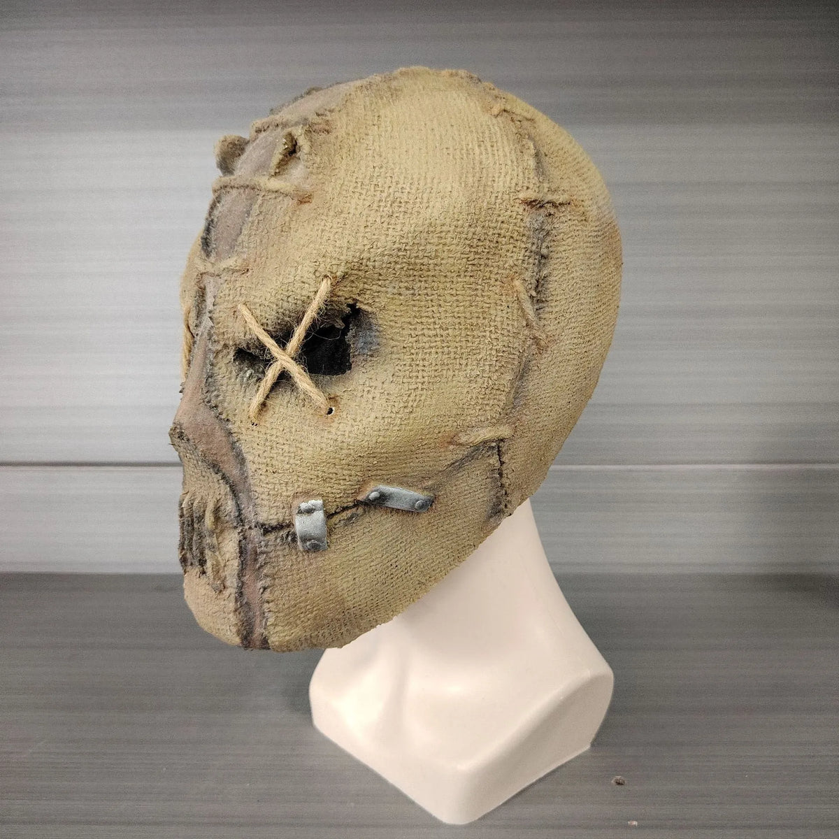 Latex full head horror mask with detailed scar skull design for Halloween costumes.