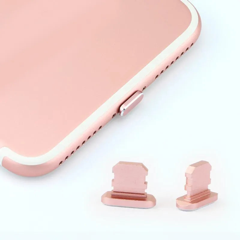 Aluminium alloy dust plug for iPhone charging port in various colours including gold and rose gold.