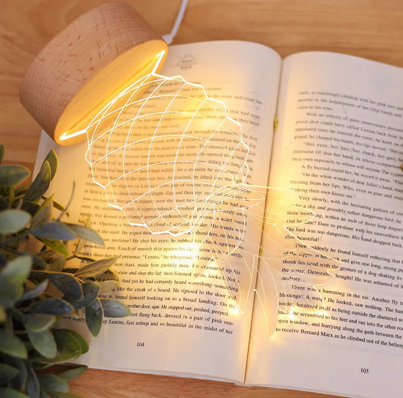Wood and acrylic pineapple-shaped cartoon night light with USB cable and dimmer switch on a table.