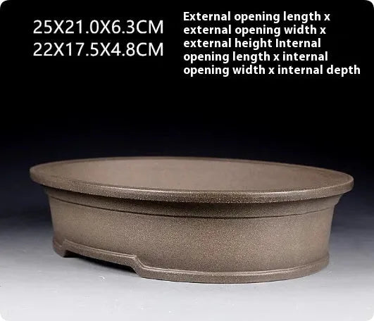 Handmade purple sand ceramic bonsai flower pot with antique oval shape measuring 25x21x6.3cm