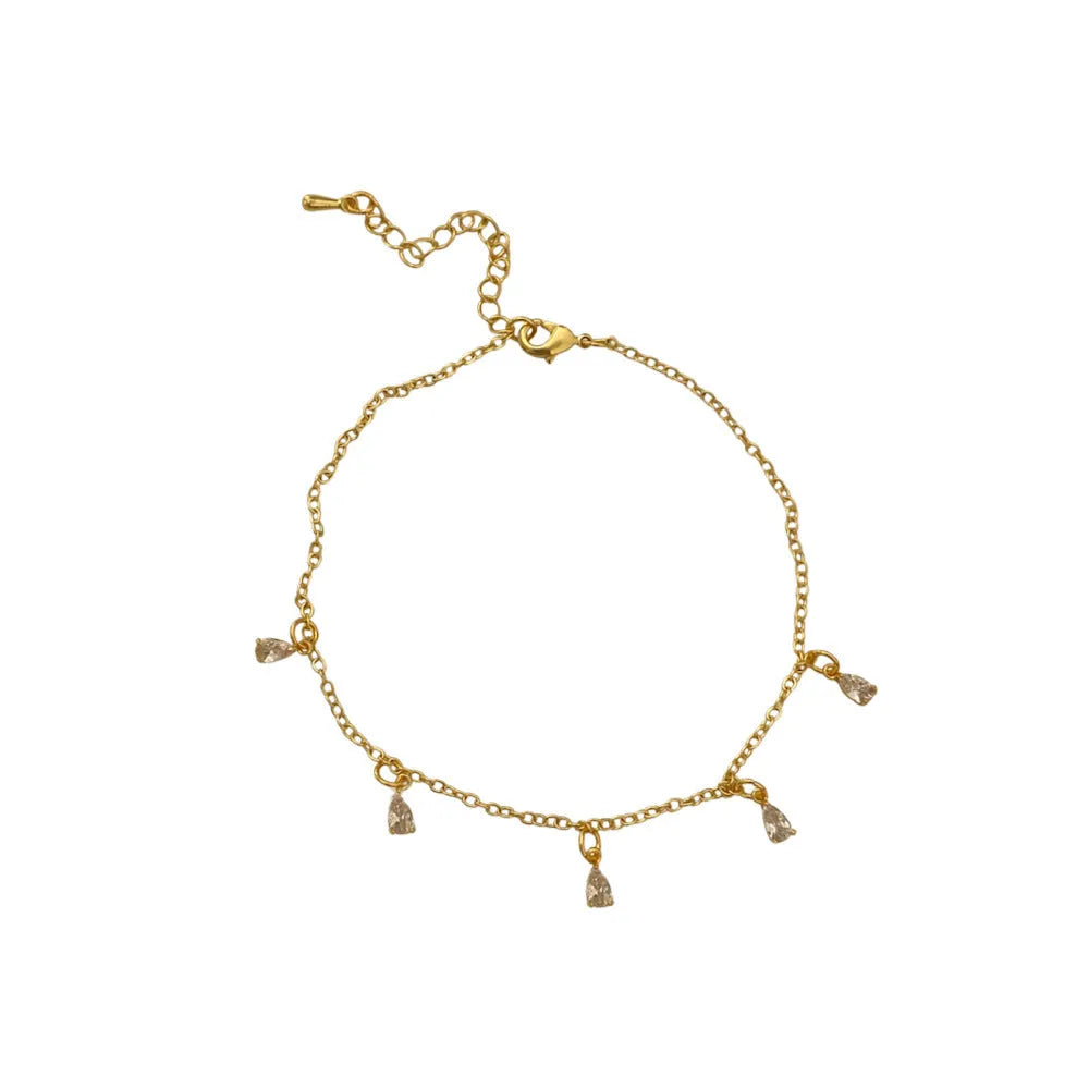 Women's zircon jewellery set showing geometric pendant necklace, matching earrings and coordinating anklet
