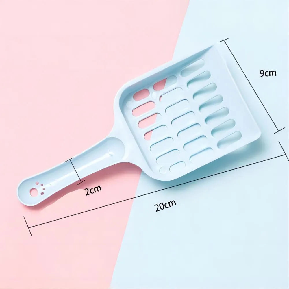 Blue plastic cat litter scoop on a white background.