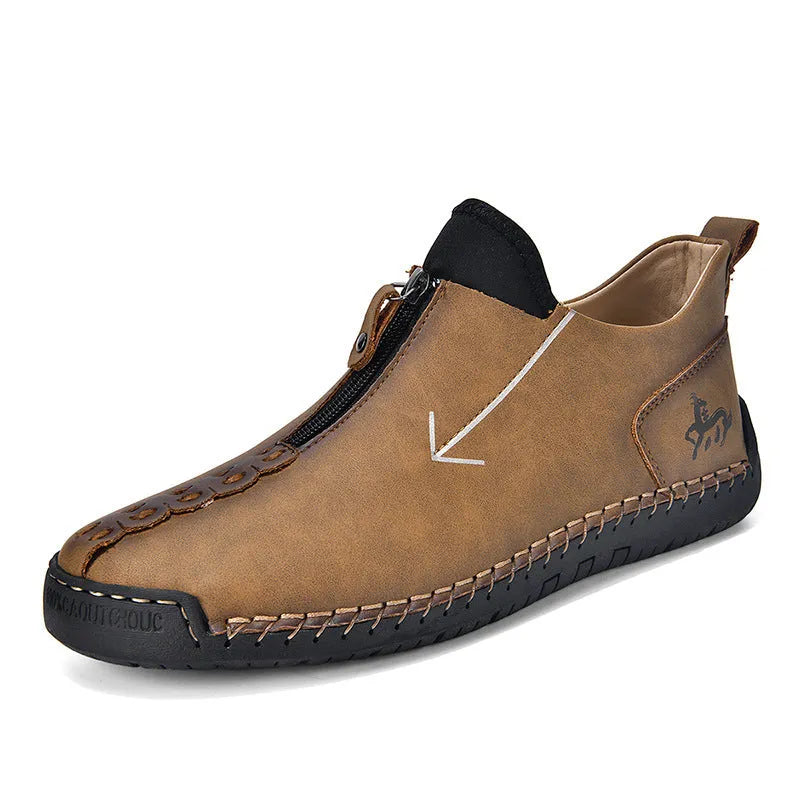 Men's black casual Martin boots with a front zip, round toe, and low rubber sole.