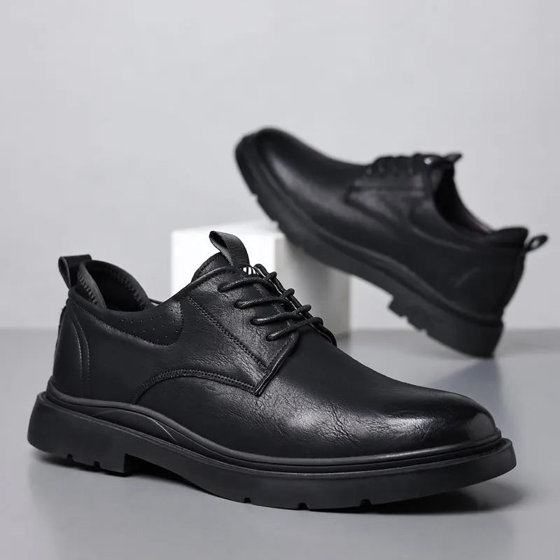 Men's black and brown leather casual sneakers with sewing line details on a two-layer cowhide upper.