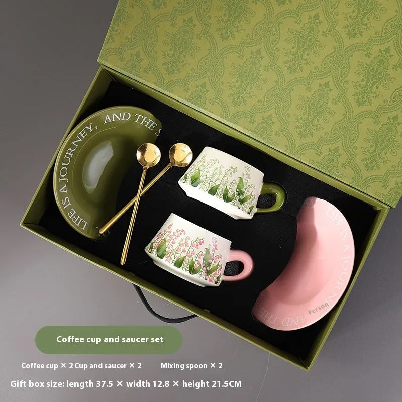 Ceramic coffee cup and saucer set with stirring spoons in Campanula or Lanling grass designs.