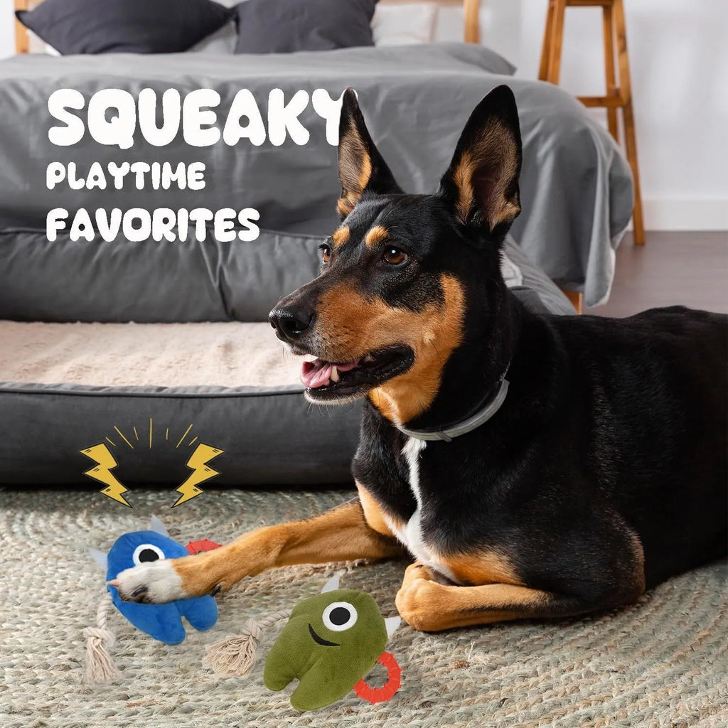 Blue and green monster-style dog toy with plush body and woven rope sections.