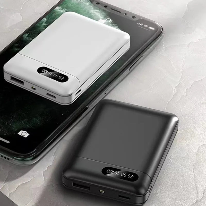Black and white portable power bank with 10000mAh capacity and USB charging ports