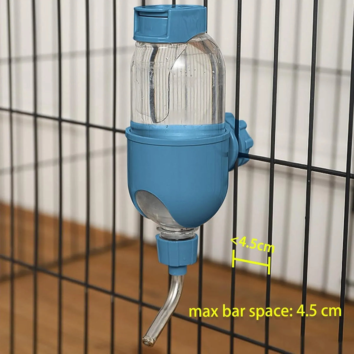 Blue small animal water bottle with rotatable nozzle attached to a wire cage bracket
