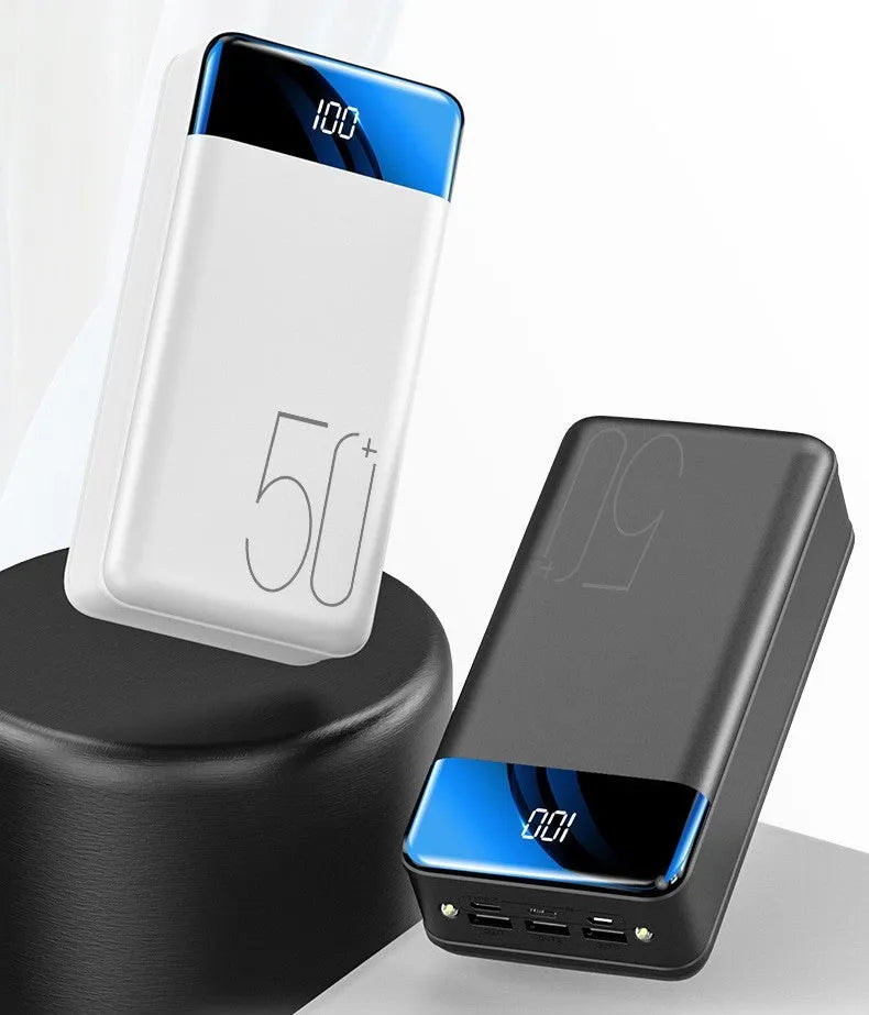 Large black or white 50000mAh power bank showing three USB output ports