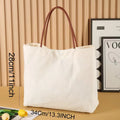 Beige white canvas tote bag made of cotton and jute with reinforced fabric handles