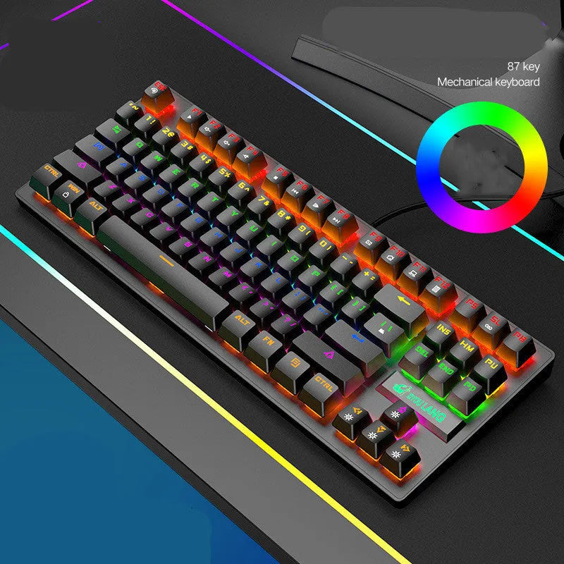 Black and white mechanical gaming keyboard with coloured key options on a desk.
