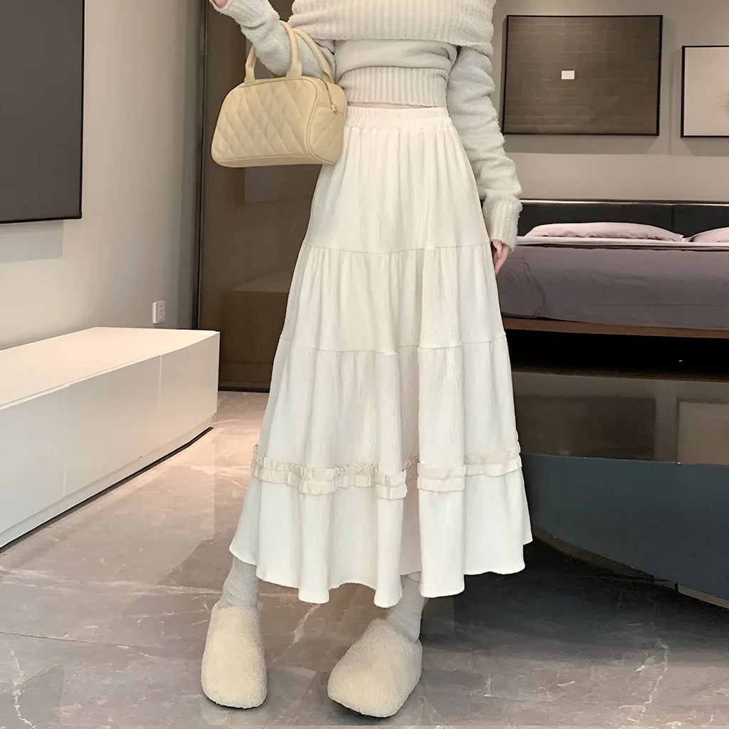 Women's corduroy A-line midi skirt with elastic waistband in milky white colour