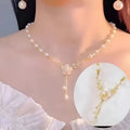 Alloy fashion necklace with pearl flower pendant featuring rose detailing in pearl flower colour