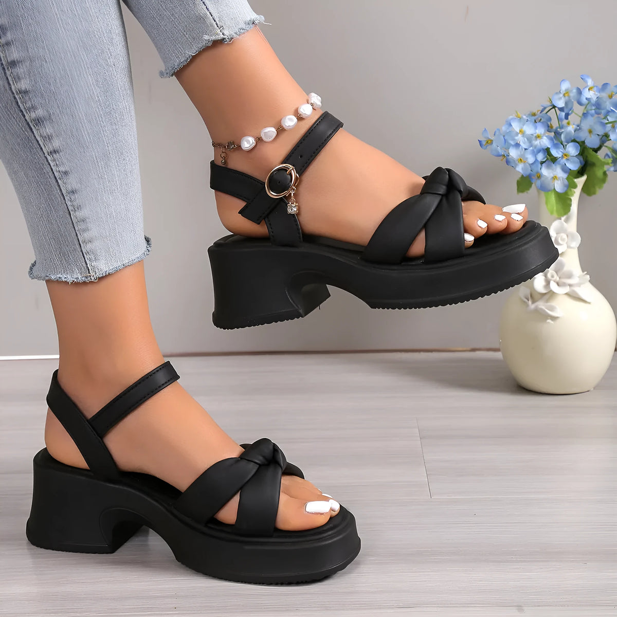 Black romantic-style high-heel slippers with thick rubber sole and button fastening