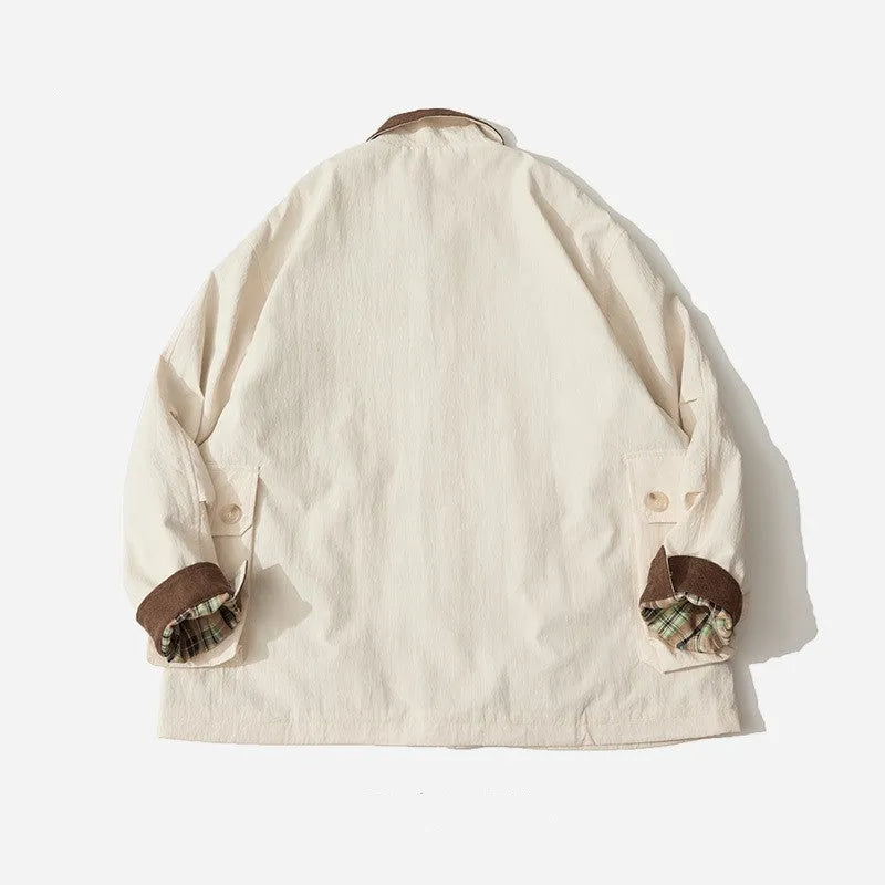 Green or apricot unisex casual jacket with long sleeves and side seam pockets