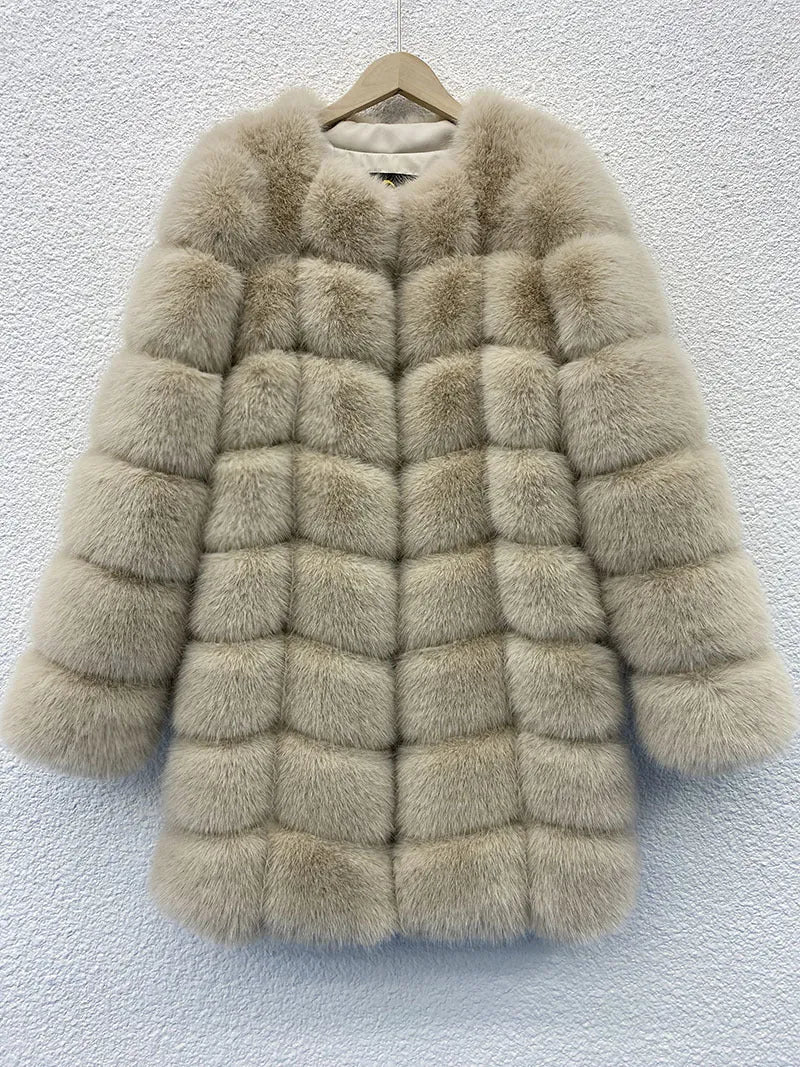 Women's long artificial fur coat in a choice of five colours, shown in a commute style setting.