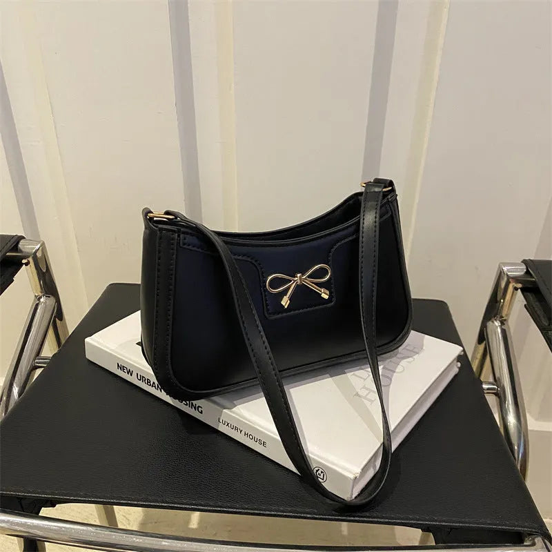 Square PU leather shoulder bag with a single strap and bow decoration in a choice of six colours