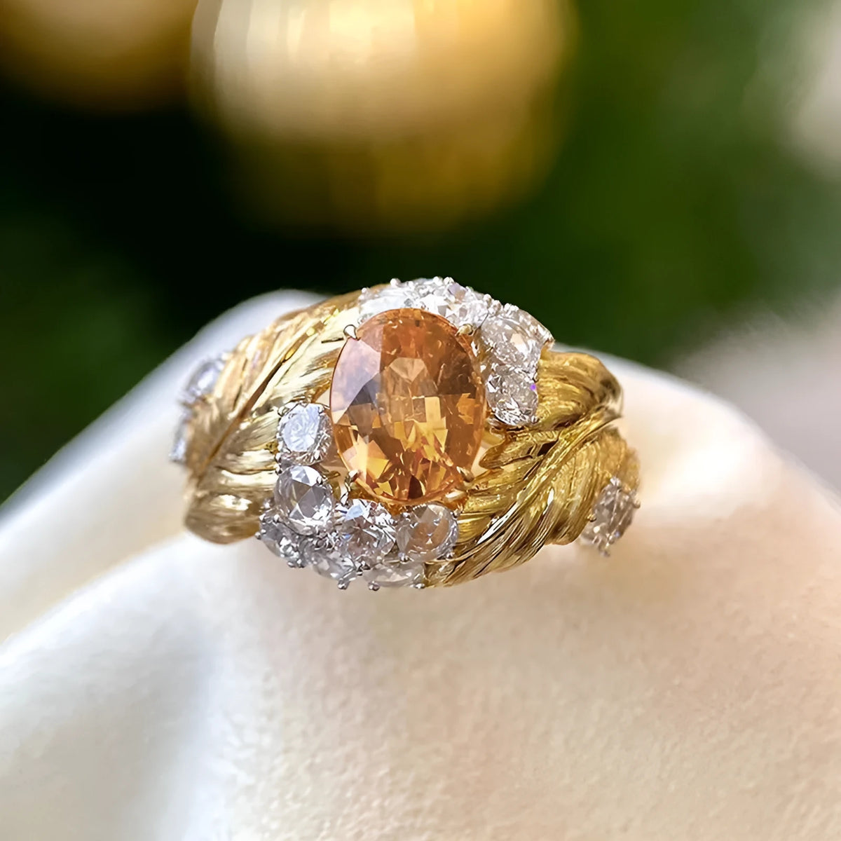 Gold colour copper feather ring with geometric embossing and yellow zircon stone centre