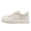 Beige plaid leisure sports shoes with a round toe and lace-up front, showing the rubber sole.