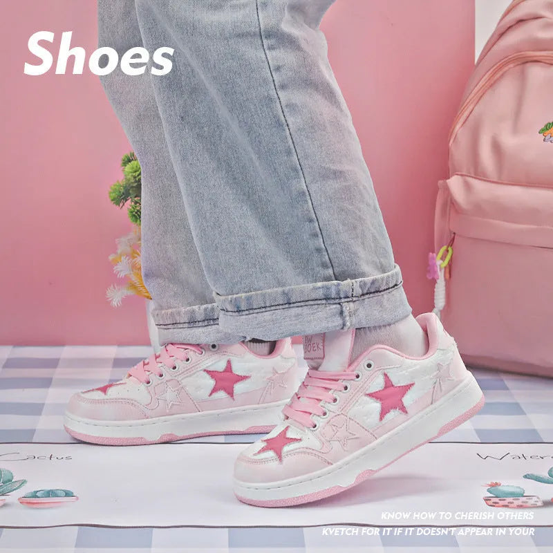 Minority denim skateboard shoes in black, green, and pink colours with rubber sole and lace-up front.