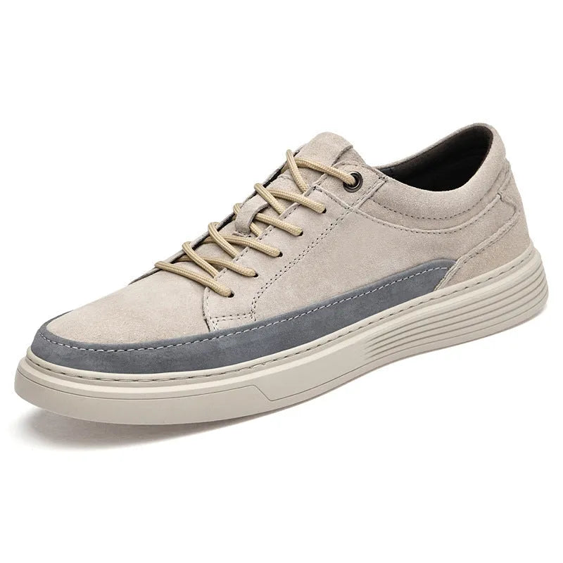 Men's grey pigskin leather casual skate shoes with a flat rubber sole and lace-up front.