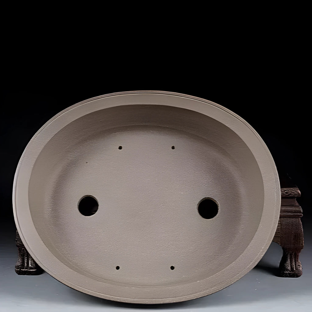Handmade purple sand ceramic bonsai flower pot with antique oval shape measuring 25x21x6.3cm