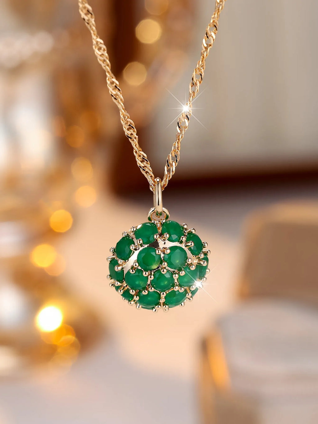 Geometric pendant necklace with round emerald diamond centrepiece on adjustable chain