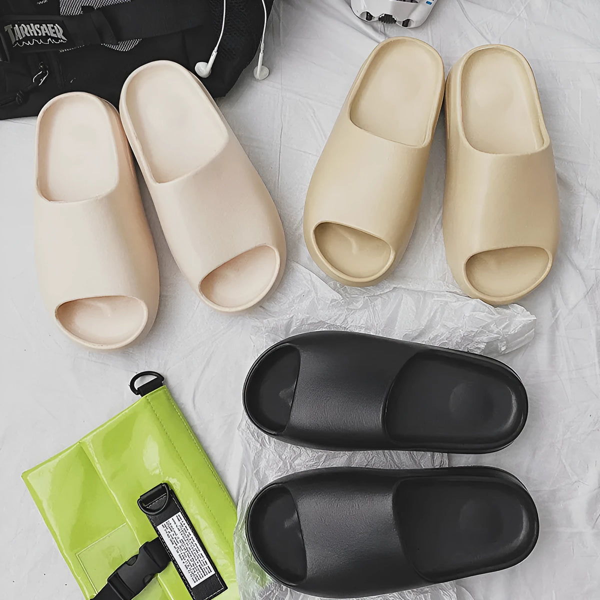 Women's thick sole beach slippers in EVA, shown in black, green, brown, and beige colour options.