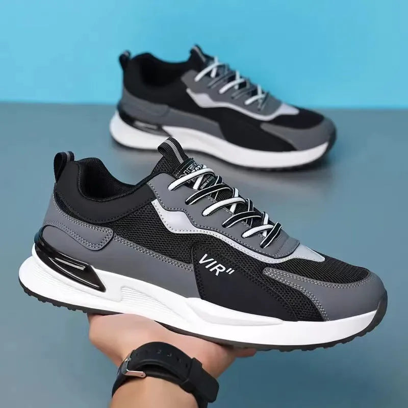 Men's colour block mesh sneakers in black, grey, or white with lace-up design and round toe.