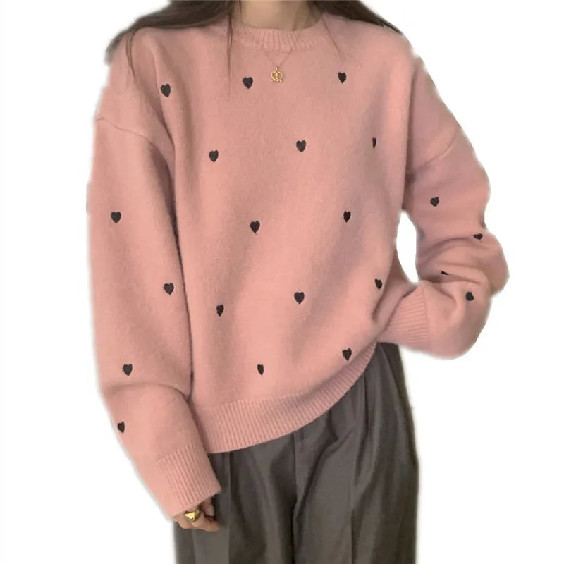 Women's loose fit crew neck acrylic sweater with embroidery detail in milky white colour