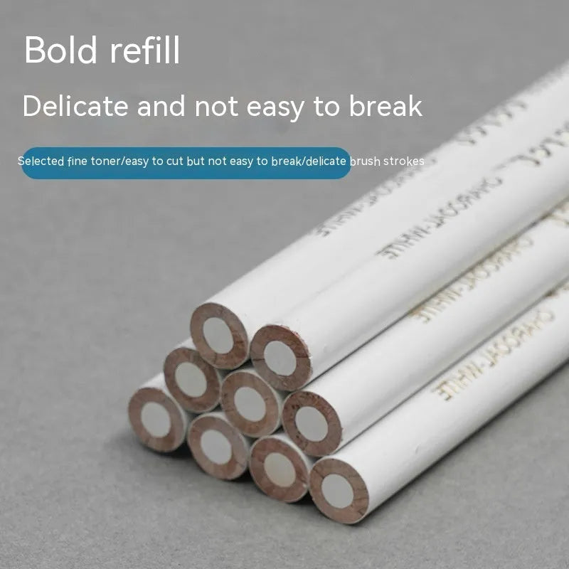 Three white charcoal pencils with wooden barrels for drawing on dark paper