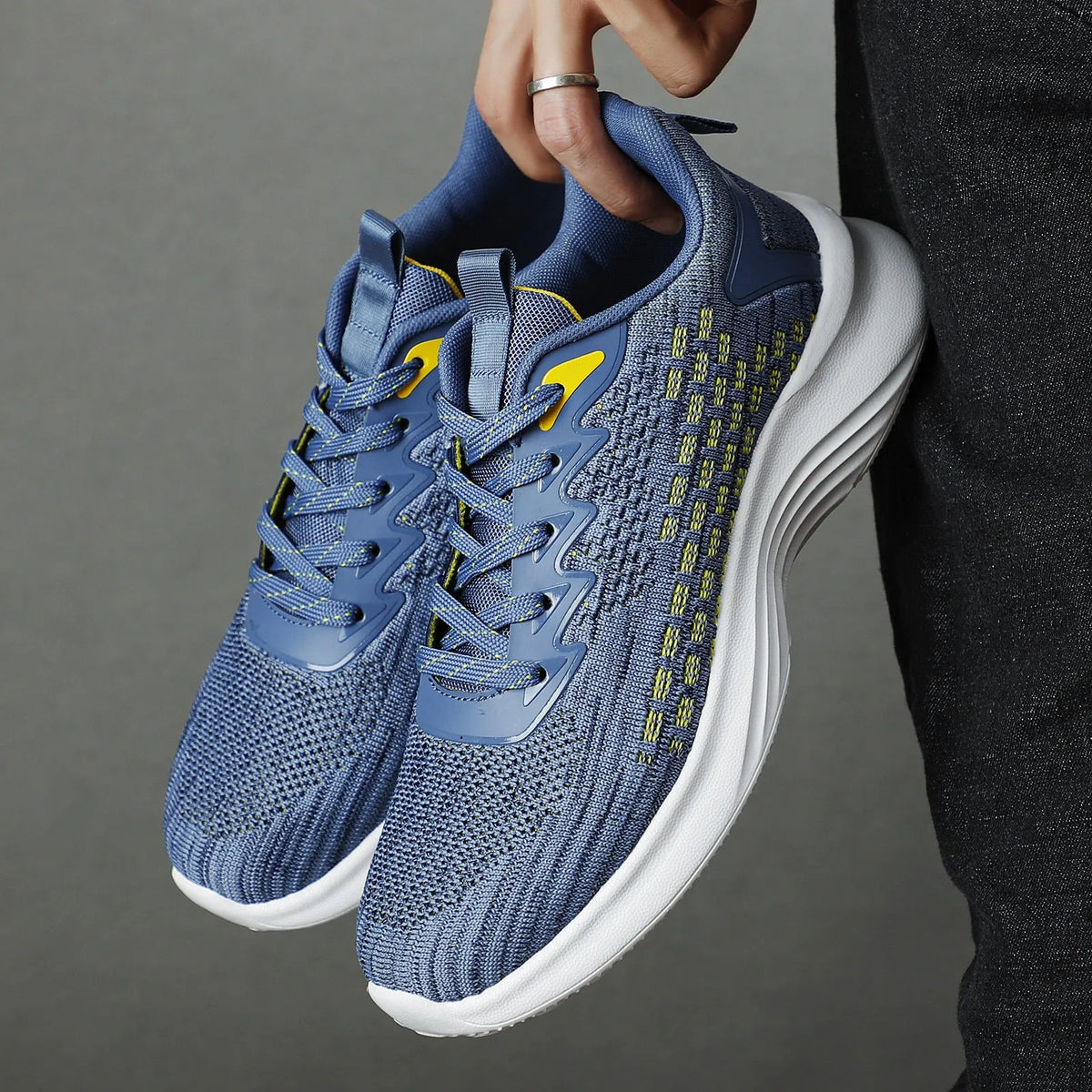 Women's Lavender Purple Flyknit running shoes with mesh upper and striped pattern on an EVA sole.