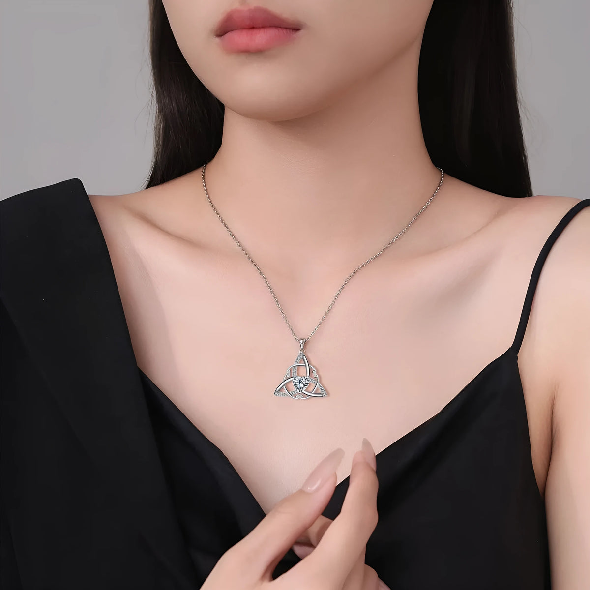 Celtic knot geometric necklace for women in electroplated copper, showing colour options.