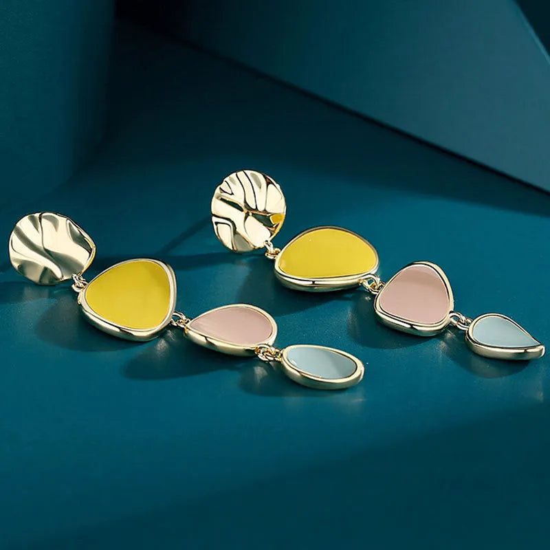 Morandi three-colour oil drip treated alloy disc stud earrings on Sterling silver posts.