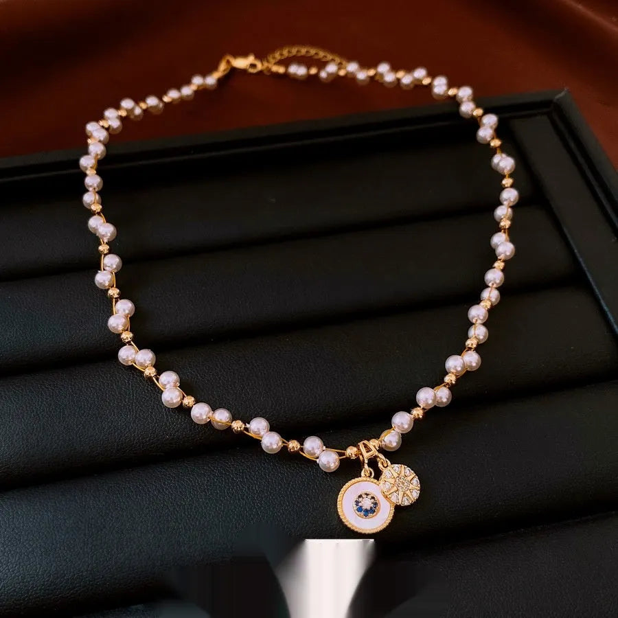 Gold electroplated necklace with round pearl pendant on adjustable 41-50cm clavicle chain