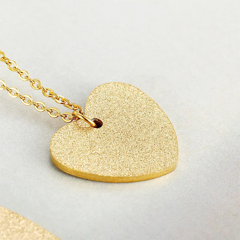 Women's silver heart-shaped titanium steel necklace with minimalist geometric design