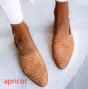Pointed-toe flat sandals with an instep buckle strap, shown in one of six available colours.