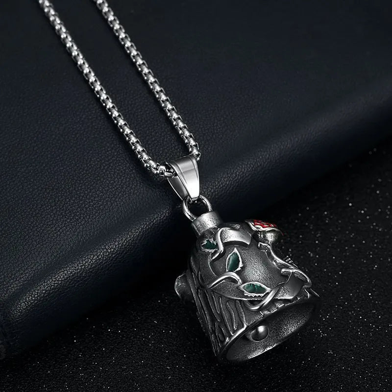 Polished titanium steel motorcycle lucky bell pendant with a double-sided epoxy rose in a geometric shape.
